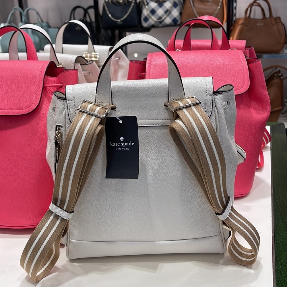 Kate Spade Rosie Medium Flap Backpack 
K8714 pebbled leather Parchment rosie
NWT - Picture 12 of 16